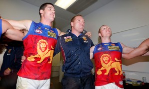 Leppitsch & the Lions celebrate their first win (photo: AFL Media/Brisbane Lions)